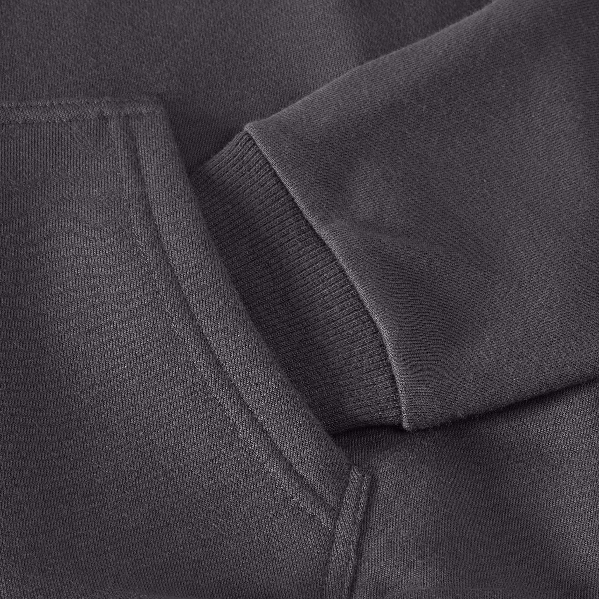 black hoodie with kangaroo pockets