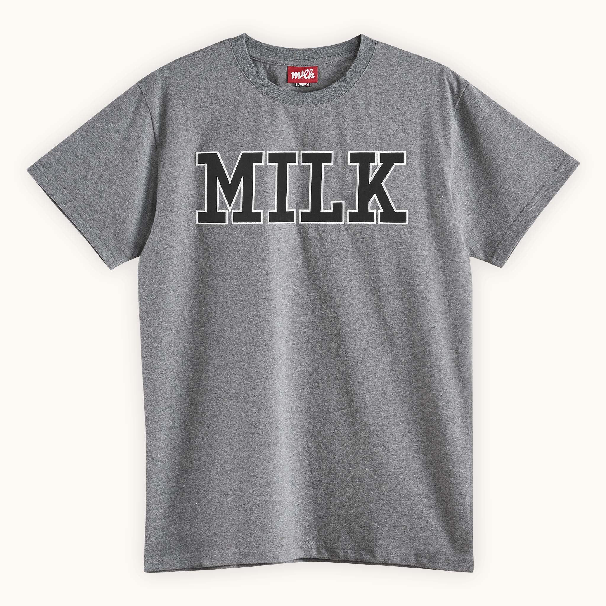 grey t-shirt with letter patches